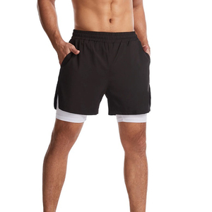 Pantalones cortos negros de doble capa de secado rápido para hombre con bolsillos, cintura elástica, ropa deportiva informal - Product Image 6