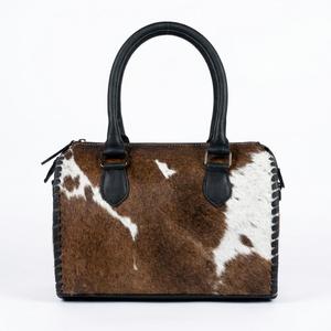 กระเป๋าถือหนังแท้ 100% รุ่นมินิสปีดดี้ แบบหูหิ้วคู่ พร้อมขอบขนสัตว์สีน้ำตาลและสีขาวเย็บติดอย่างประณีต - Product Image 1