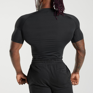 Camisetas de compresión para hombre, ajustadas, para gimnasio, entrenamiento, atléticas, de tela elástica, transpirable, de alto rendimiento, deportivas. - Product Image 4