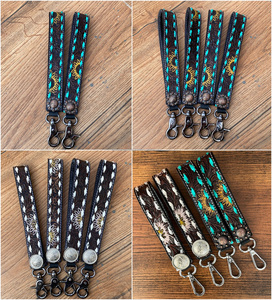 Nouvel arrivage Bracelet en cuir usiné à motifs floraux occidentaux Porte-clés en cuir véritable Porte-clés de voiture Porte-sangle Lanière pour femmes - Product Image 3
