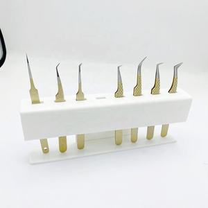 Vente en gros Aroosh Corp Ensemble de pinces professionnelles à paillettes dorées de haute qualité en acier inoxydable massif avec prise en diamant Extension de cils - Product Image 1