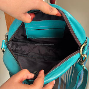 2025 Luxury Design Turquoise Round Fringe Western Charm and Modern boho Style Genuine Cowhide Leather Crossbody Casual Handbags - Product Image 6
