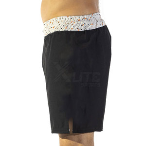 Shorts d'entraînement MMA légers et extensibles avec logo frontal, conçus pour la vitesse, la flexibilité et la performance - Product Image 6