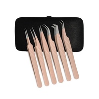 Pince à épiler professionnelle de précision en acier inoxydable durable, manche blanc, pointe dorée, lisse et pointue, logo personnalisé, pour volume et cils artificiels