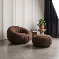 Ensemble fauteuil et ottoman de luxe en bouclette ivoire, style Mid-Century Modern, design à cannelures arrondies, doux, pour salon, villa, hôtel