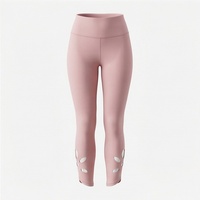 Leggings de yoga taille haute mi-mollet avec design ajouré, rose uni, en Spandex et Nylon, ajustement sans couture