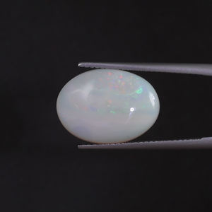 โอปอลสีขาวธรรมชาติ รูปไข่ 6.83 กะรัต ขนาด 17x12.5 มม. ได้รับการรับรองจาก IGI ขัดเงาด้วยมือ ผ่านการเคลือบแว็กซ์/น้ำมัน - Product Image 1