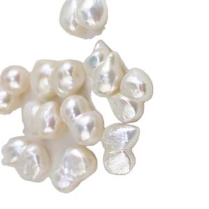 ไข่มุกน้ำจืดเจาะครึ่งเม็ดสีขาวไข่มุกทรงมะระบาร็อคสีขาว12มม. ราคาโรงงานจำนวนมาก - Product Image 1