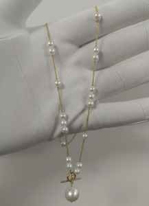 Collar de Perlas de Oro de 18 Quilates con Cierre en T y Colgante de Perla de Agua Dulce - Product Image 2