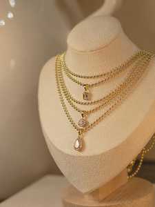 จี้เพชรทรงหยดน้ำ 2 กะรัต เพาะเลี้ยงในห้องปฏิบัติการ พร้อมสร้อยคอทอง 14K ชุบทอง ประดับเพชรเม็ดเดี่ยวทรงหยดน้ำ ความยาว 17 นิ้ว พร้อมสร้อยลูกปัดแบบซ้อนชั้น  IGI - Product Image 5