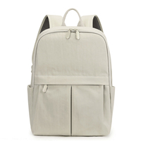 Sac à dos décontracté unisexe beige géométrique en polyester avec fermeture éclair, grande capacité 36-56L, poches avant, idéal pour l'école, les voyages et le quotidien des étudiants