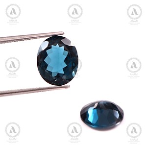 ANAM EMPORIUM Topaze Naturelle Bleu de Londres Pierre Précieuse Non Montée 10*12mm Coupe Ovale 6.70 Cts Iridescence Bonne Qualité Bleu Royal Propre - Product Image 1