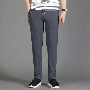 Pantalon de sport gris pour homme, taille élastique, séchage rapide, avec poches latérales, coupe décontractée légère, idéal pour le printemps - Product Image 1