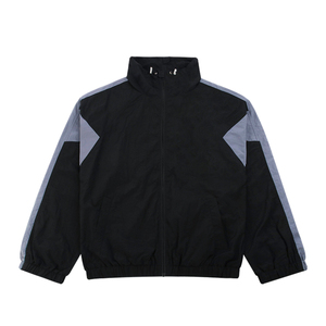 Veste de course coupe-vent bleue pour homme avec empiècements blancs et logo brodé, fermeture éclair frontale, style sportif, idéale pour le printemps - Product Image 4