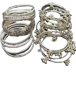 Jewlery Bangles of traditional cultural style with latest designs of 21st century silver golden and colorful jewlery bangles