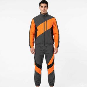 ชุดเสื้อแจ็คเก็ตสตรีทแวร์แบบกำหนดเอง ผลิตแบบ OEM ดีไซน์คัลเลอร์บล็อก 2 in 1 เป็นมิตรกับสิ่งแวดล้อม แห้งเร็ว ผลิตจากโพลีเอสเตอร์ 100% - Product Image 4