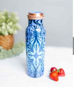 Copper <b>bottle</b> that <b>blends</b> into everyday routine offering a sense of familiarity and reliable hydration throughout the day - Product Image 5