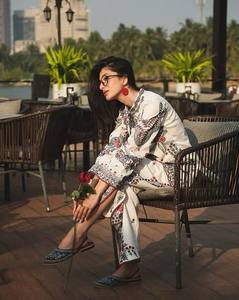 Elegant white maslin cotton <b>kurti</b> with heavy thread embroidery border handmade latkan neck paired with embroidered plazzo set - Product Image 4