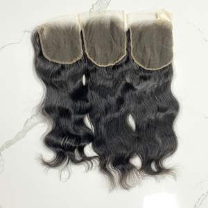 Fermeture HD dentelle ondulée Textures 100% Extensions de cheveux humains vietnamiens cuticule aligné tissage cheveux prix de gros pour les femmes noires - Product Image 1