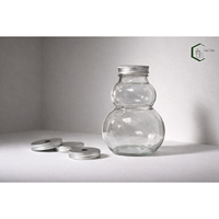 Bouteille en plastique PET de 500 ml en forme de gourde avec bouchon à vis en aluminium, emballage OEM pour boissons (lait, thé, jus, café) du Vietnam