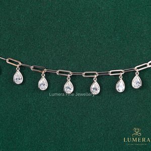 Statement Pear Cut Diamond Charm Bracelet With Lab Grown Stones Suspended Along Open Basket Settings <b>Solid</b> <b>Gold</b> Paperclip Chain - Product Image 1