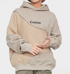 Großhandel Patchwork-Hoodie Herren Schwergewichts-Fleece Übergroßer Pullover Zweifarbig mit Rohkanten-Panel Stickerei Streetwear Winter - Product Image 1