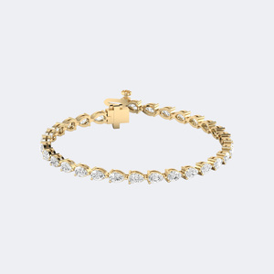 Bracelet tennis de luxe plaqué or 18 carats avec diamant de laboratoire taille poire couleur E de 6,20 CTW, serti trois griffes en forme de panier - Product Image 1