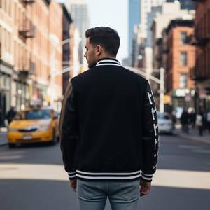 Chaqueta Varsity Negra de Lana Estilo High Street |   Chaqueta Varsity Personalizada con Mangas Cruzadas, Parche de Letras de Chenille y Cuello Alto - Product Image 2