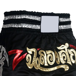 GRACE COLLECTION Pantalones Cortos Negros de Artes Marciales Mixtas para Mujer, Corte Regular, Diseño con Letras Tailandesas, Detalles en Rojo y Dorado, Poliéster y Nailon Elásticos - Product Image 4