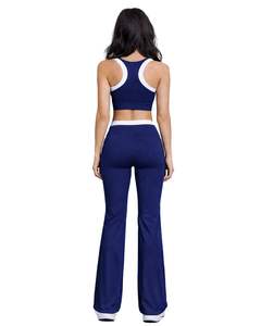 ชุดออกกำลังกายผู้หญิงสีน้ำเงินกรมท่าตัดขาว ประกอบด้วยเสื้อชั้นในกีฬาและกางเกงขาบานเอวสูง ผ้าสเตรช เหมาะสำหรับโยคะ ฟิตเนส และยิม รับผลิตตามสั่ง ขายส่ง OEM - Product Image 2