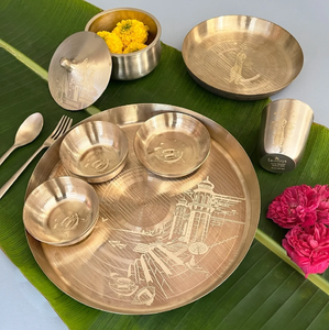 Intricately <b>carved</b> floral border Kansa bronze thali <b>set</b> with bowls, tumbler, <b>and</b> spoon, available at wholesale prices. - Product Image 5