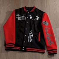 Veste universitaire noire pour homme avec broderie chenille et manches en cuir pour le baseball, vente en gros