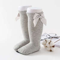 Chaussettes en coton pour bébés filles, design personnalisé, logo, motif nœuds, pour l'hiver et Noël, fabricant et fournisseur direct du Vietnam