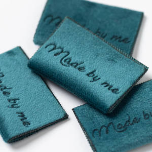 Étiquette tissée personnalisée avec logo de marque pour vêtements, pliée au centre, découpée sur mesure - Product Image 5