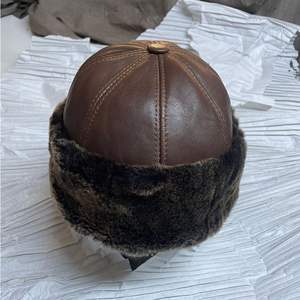 This is a light <b>yellow</b> genuine leather baseball cap with an adjustable strap - Product Image 5