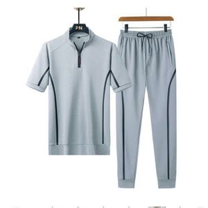 Women's <b>Polyester</b> <b>Tracksuit</b> Set Stand Collar Solid Short Sleeve Top Full Length Pants Summer Casual Breathable Pocket Gym Wear - Product Image 3