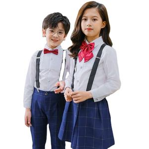 Uniforme Escolar Primario Unisex para Niños de BARU ENTERPRISES, Camisa Blanca, Falda a Cuadros Azul, Pantalones, Corbata de Moño Roja, Algodón Oxford - Product Image 1