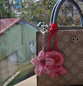 Porte-clés brodé de perles de créateur avec travail artisanal traditionnel et esthétique moderne - Product Image 1