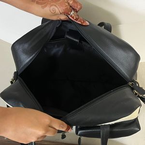 Bolsa de Pañales de Cuero Vacuno Genuino Personalizada OEM, Bolsa de Viaje Multibolsillos con Cierre, Organizador de Artículos para Bebés, Venta al Por Mayor - Product Image 4