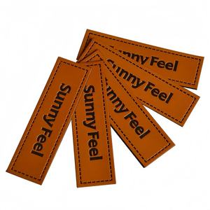 Sunny Feel PU Leather Embroidered Logo Patches Beige Adhesive Labels for Clothing Garments - Product Image 1