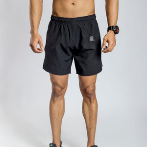 Men's <b>Black</b> Solid Quick Dry Breathable Sport Shorts Elastic Waist Knee Length Nonwoven Polyester Front Logo Drawstring Closure - Product Image 5
