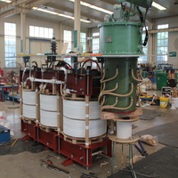 Transformateur de distribution immergé dans l'huile Dyn11 10 kV vers 400 V avec commutateur de branche sous charge, pour usage extérieur, postes de transformation et réseaux industriels