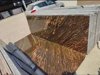 Dalles et blocs de pierre en granit doré de qualité supérieure pour maisons de luxe, hôtels, bureaux et projets architecturaux