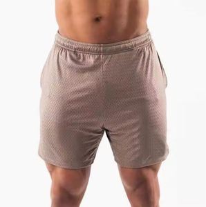 กางเกงขาสั้นตาข่ายเนื้อผ้าระบายอากาศได้ดี สวมใส่สบาย แห้งเร็ว ป้องกันรังสียูวี เป็นมิตรกับสิ่งแวดล้อม ผลิตจากผ้าฝ้ายผสม เหมาะสำหรับออกกำลังกายและสวมใส่ลำลอง - Product Image 1