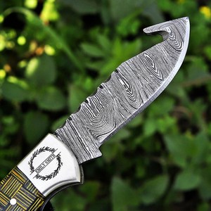 ผู้จัดจำหน่ายมีดพับแบบ Bulk Damascus Gut Hook พร้อมระบบล็อคด้านหลัง มีดพกพาสำหรับล่าสัตว์ ตั้งแคมป์ และใช้ในชีวิตประจำวัน ด้ามจับไม้โมเสก สำหรับงานอุตสาหกรรม - Product Image 6