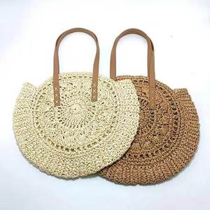Upgrade your daily <b>accessory</b> collection with this premium Natural yarn bag designed with a round body and slender grips now - Product Image 4