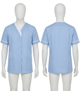 Uniforme de Chef Premium para Mujer en Polialgodón, Color Azul Claro con Ribete Blanco, Diseño de Panel con Logotipo Bordado e Impreso, Diseño Personalizado del Panel Frontal - Product Image 1