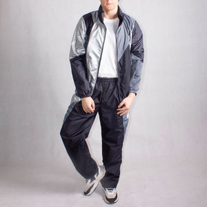 Ensemble de survêtement pour homme à blocs de couleur, manches longues, col montant, style sportif, coupe régulière, polyester léger, idéal pour le printemps - Product Image 1