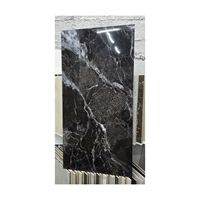 Carreaux de porcelaine noire de luxe Golden Vein avec des veines multicolores, finition très brillante, 60x120cm, design moderne pour sol et mur