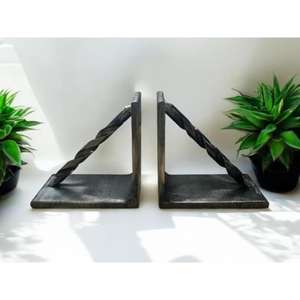 Sujetalibros de hierro de diseño con estructura artística para una decoración del hogar única y un almacenamiento práctico de libros - Product Image 2